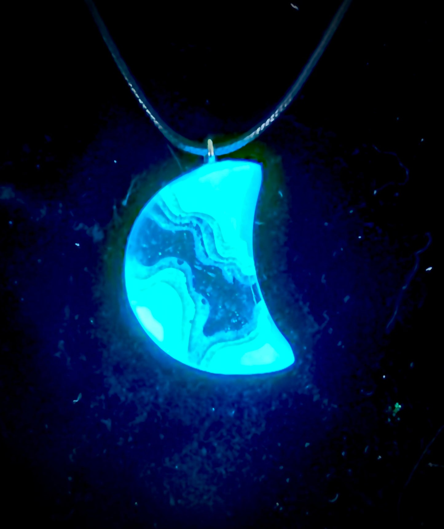 Glow necklace. Luminous pendant, glow in the dark jewelry, UV, black light