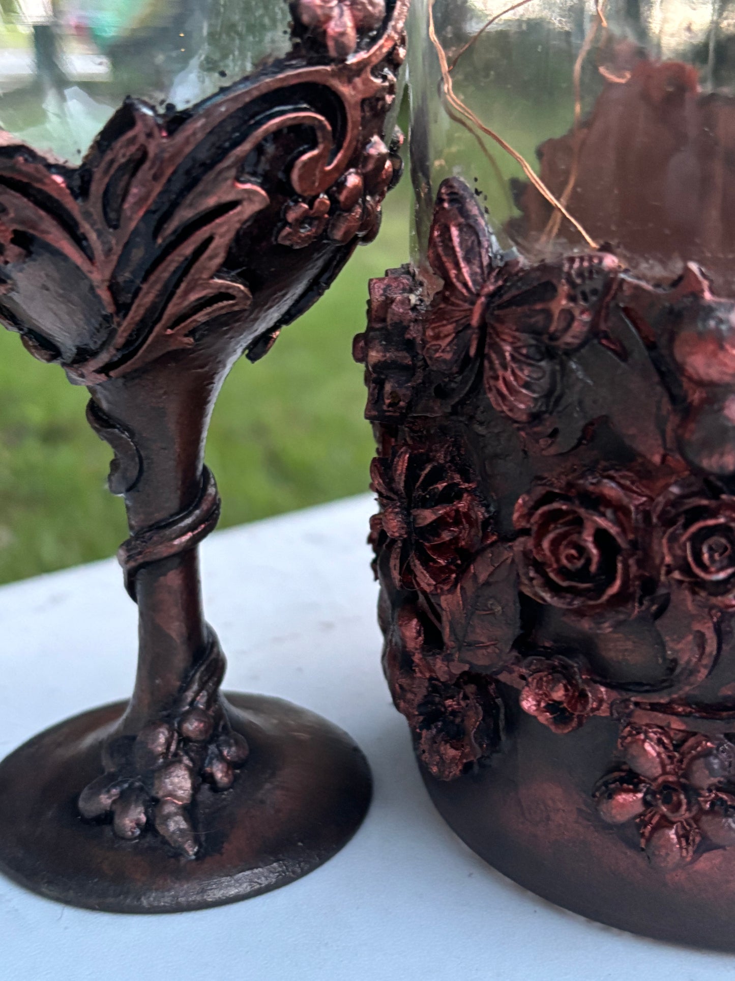 Wine bottle and glasses.  Aged metallic effect.  Copper look